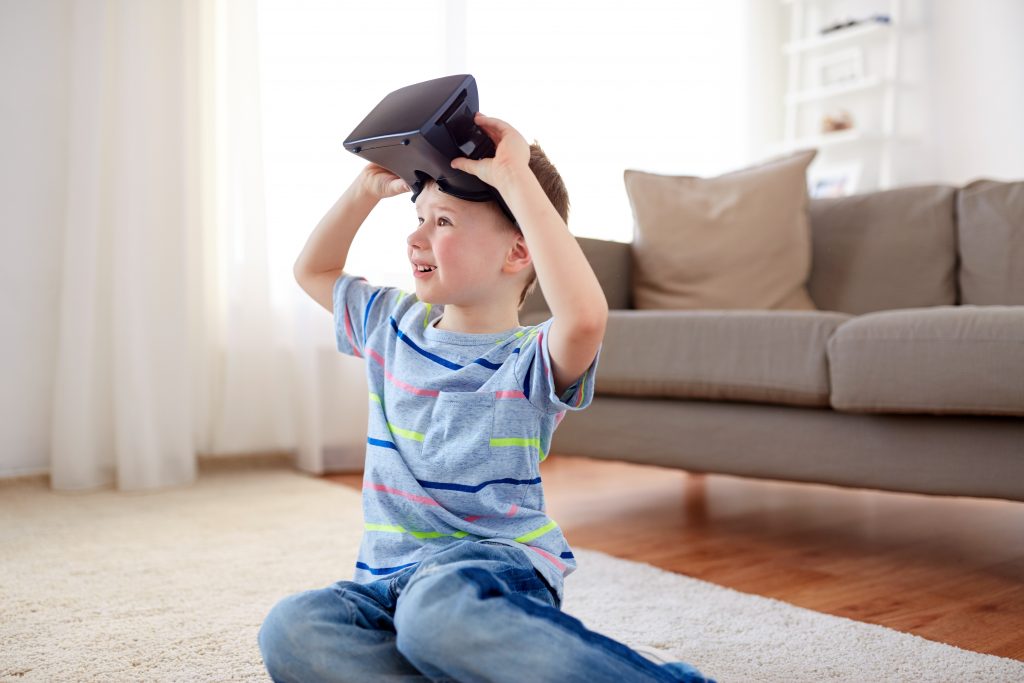 little-boy-in-vr-headset-or-3d-glasses-at-home
